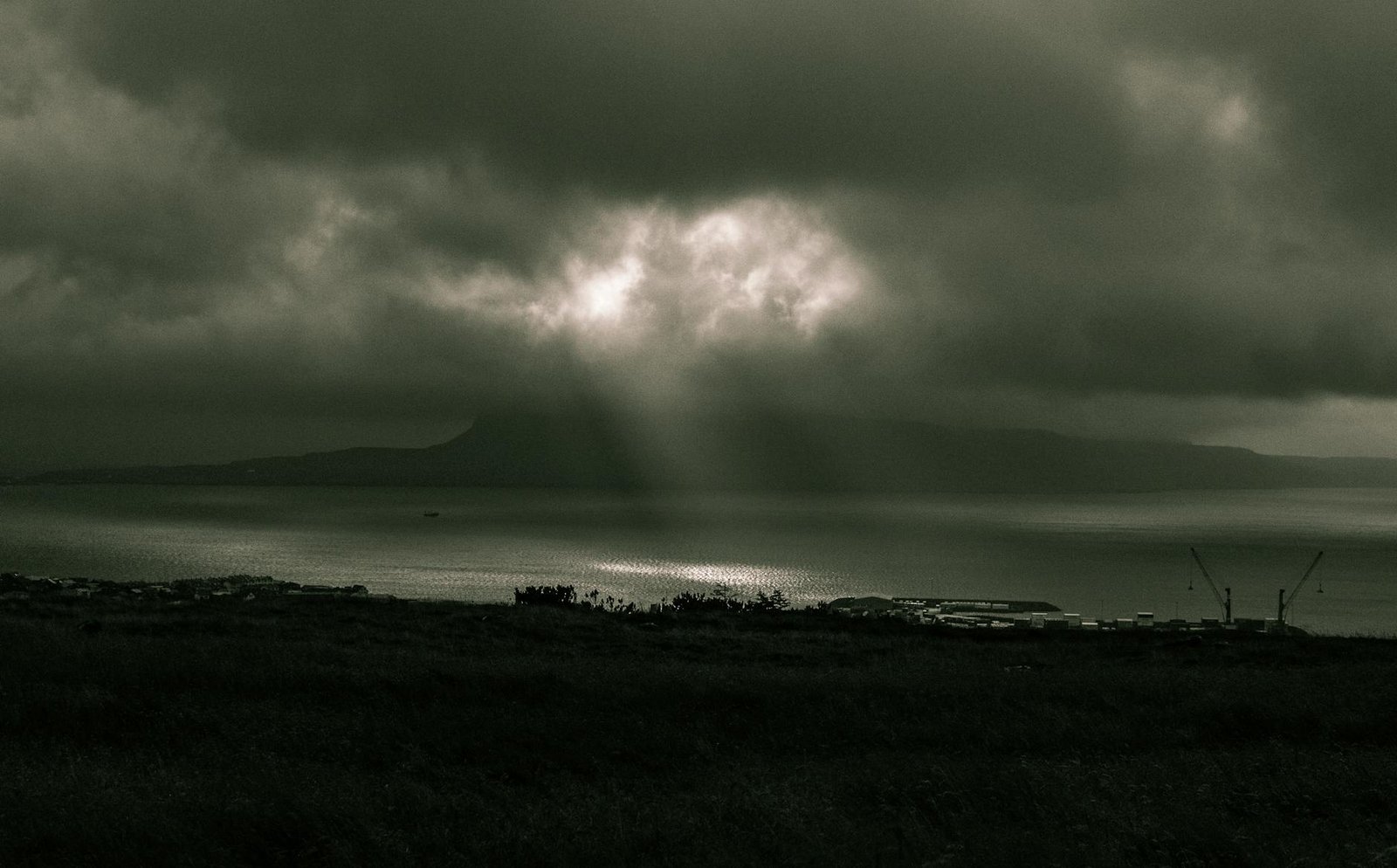 Grass Rooftops, Gunmetal Skies, and the Quiet Thunder of the Faroe Islands Arriving at Tórshavn