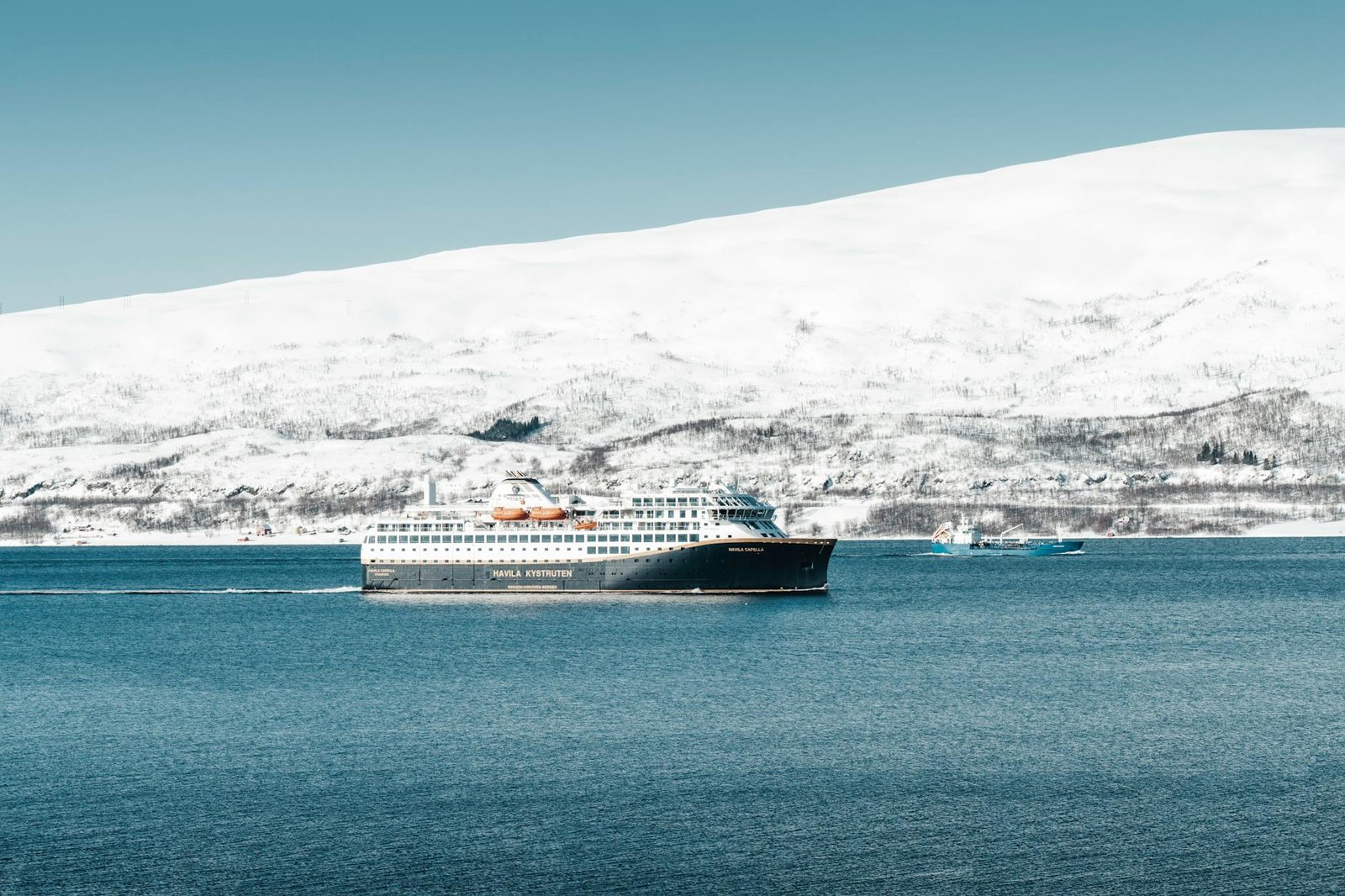 Fog Lifting Over the Fjord: Arriving by Ship at Kjollefjord